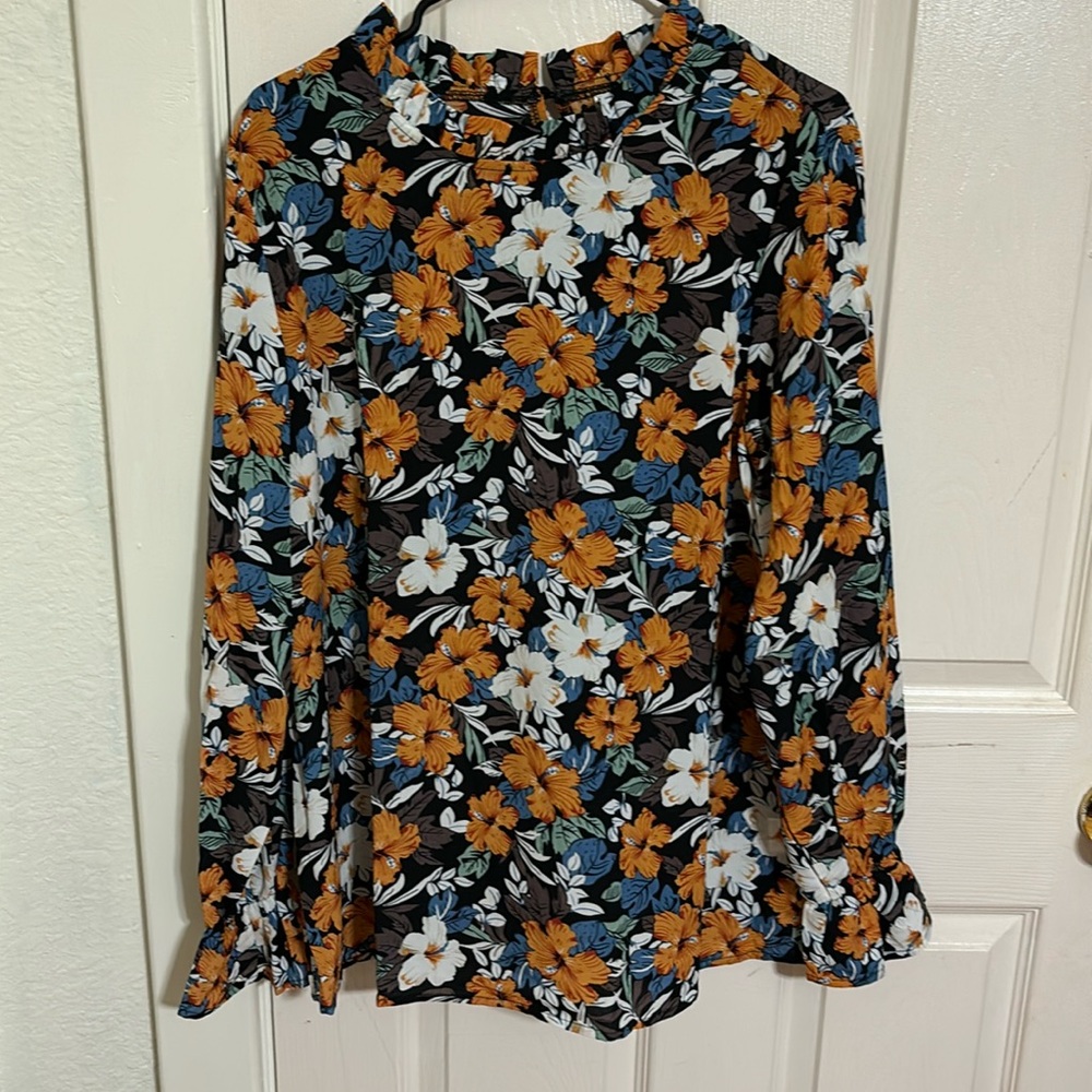 Floral blouse worn 2 or 3 times